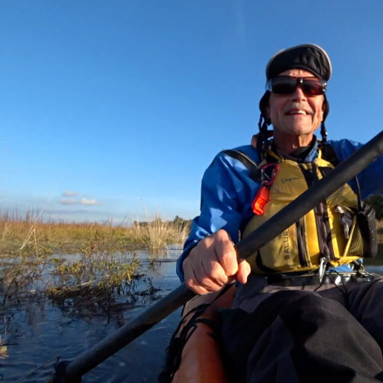 Bob Turner paddling his kayak.